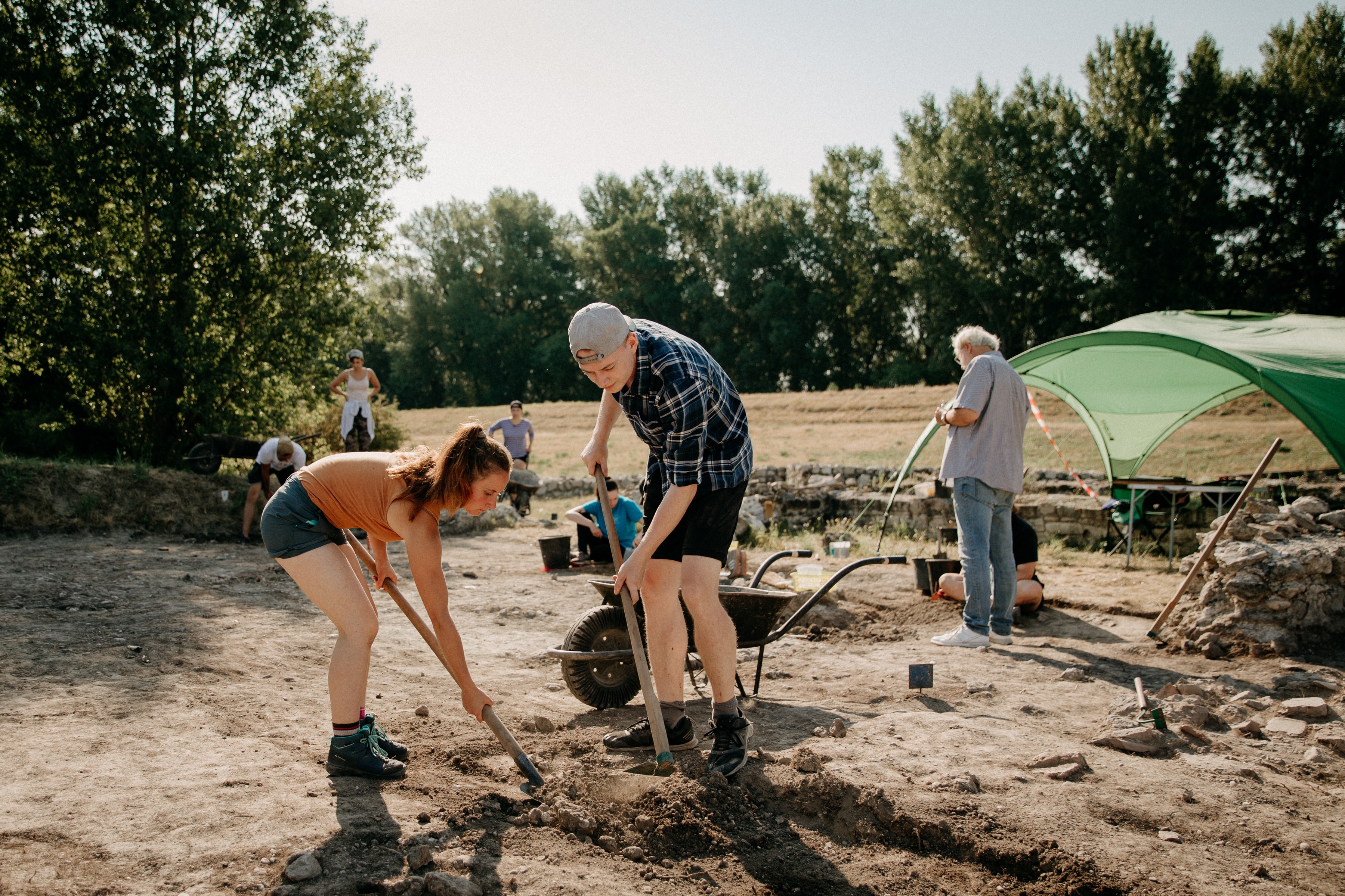 Image of people digging in the ground